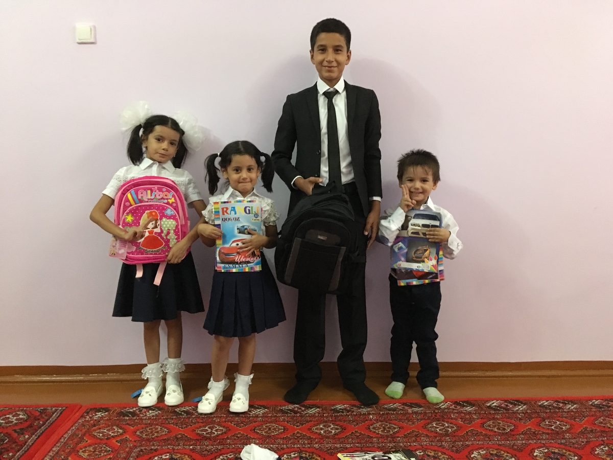 Khiva children with new backpacks